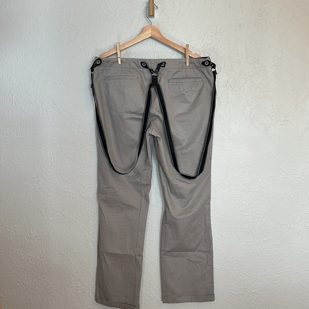 Dirty English pants with suspenders